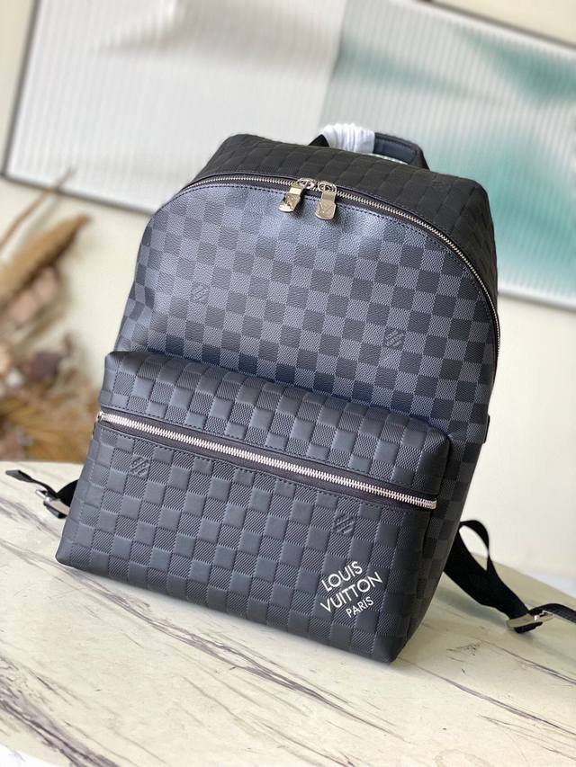 650 头层皮 顶原级单N40436 本款 Discovery 小双号肩包出自 Damier2 系列，拼合 Damier Infini 皮革和 Damier G - 点击图像关闭