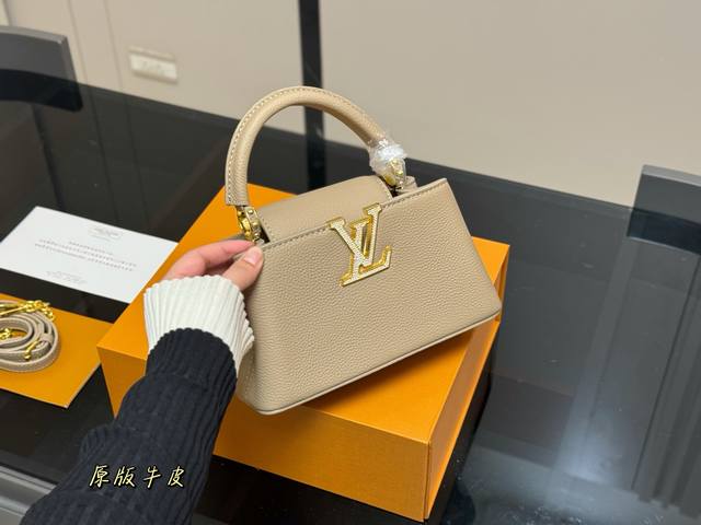 ￥370 配折叠盒 size ：22*12Cm（小） lv Capucines手袋 全粒纹Taurillon牛皮裁制 感觉低调 但有奢华质感 ！！ 经典！经典！