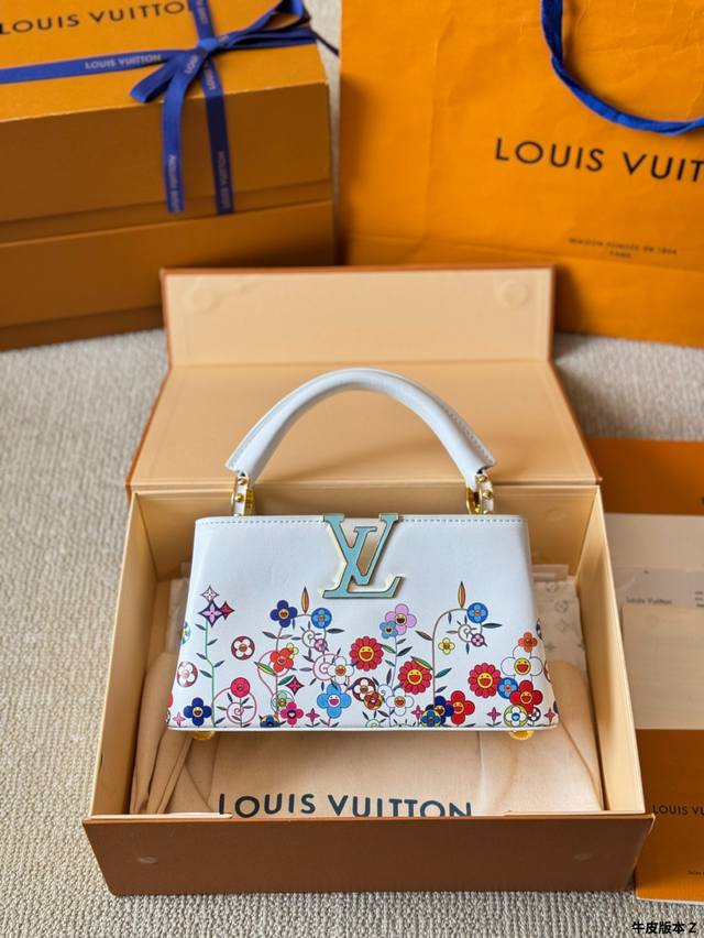 牛皮版本 P200 lv Capucines 作为Lv代表性高定包款之一的Capucines手袋，每一季都会尝试不同的设计，并搭配新配色、新材质与新饰面。更加高