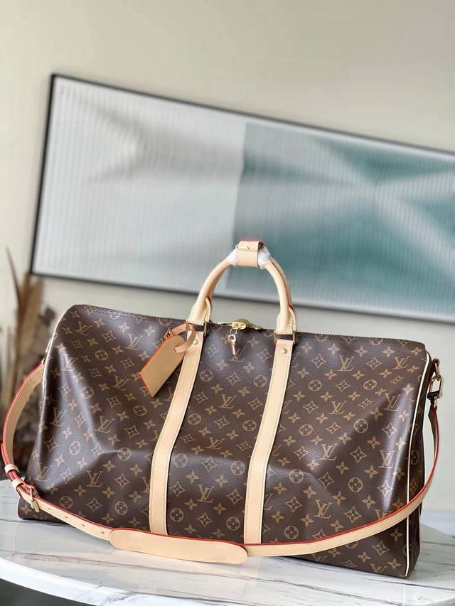 55尺寸 顶级原单 M41414 老花黄皮 容量宽敞，使用灵活。经久耐用，安全可靠。时尚风格，成熟稳重。采用安全的双拉链和挂锁，因此特别适于商务或娱乐之用。尺寸