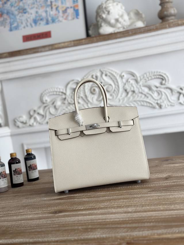 Bk 进口Epsom皮 半手工手缝蜡线 颜色：奶昔白、银扣 尺寸：25Cm