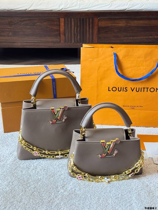 牛皮版本 Lv Capucines 作为Lv代表性高定包款之一的Capucines手袋，每一季都会尝试不同的设计，并搭配新配色、新材质与新饰面。更加高端气质。