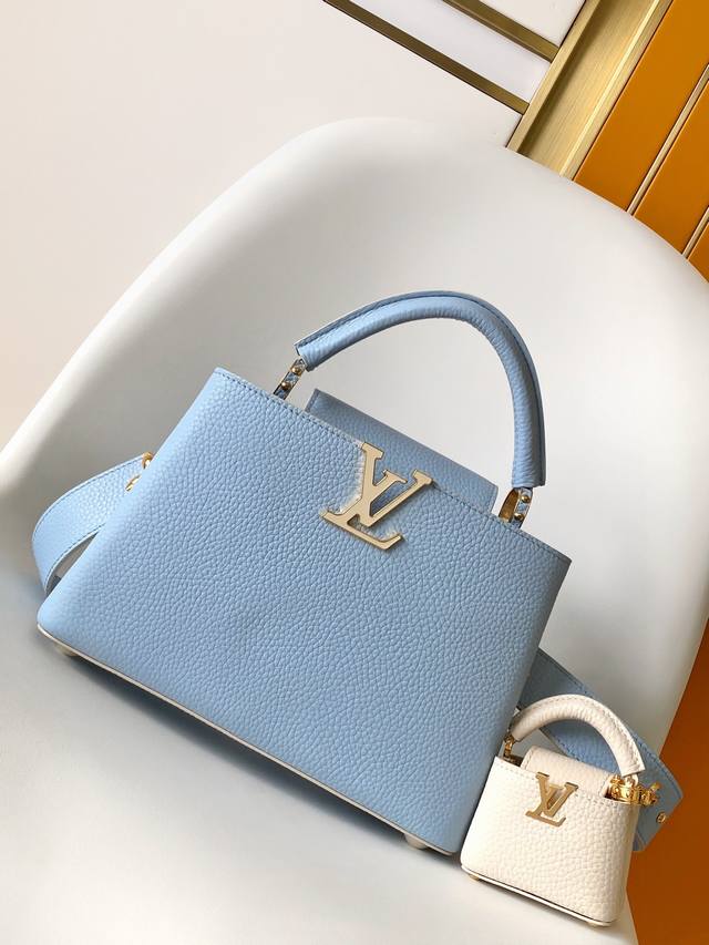 M24575蓝 M24120粉 M24563黄 特级原厂皮 动态变码本款 Capucines 迷你手袋选用 Taurillon 皮革和宛若珠宝的釉面金属件，再以