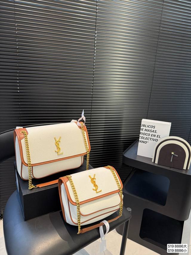 配折叠盒子 圣罗兰邮差包 非常特别，低调的有些酷，背起来特别的能体现时髦 个性 帅气女人的魅力，它就是Ysl目前人气最高的Niki邮差包。背这款包的女人都很不简