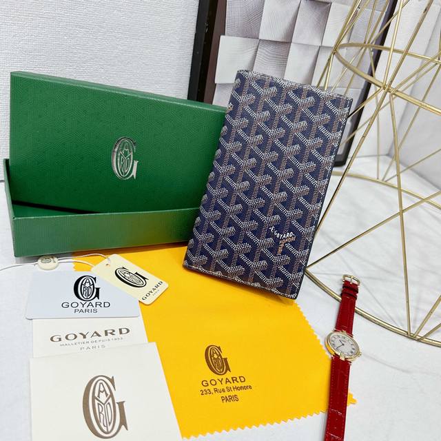 戈雅多功能旅行钱包 机票夹 ，附主票仓1个，侧开票仓2个，机票隔层2个，卡位9个，集时尚多功能为一体，可以存放机票、现金、护照、各种银行卡等。 款号: 9812