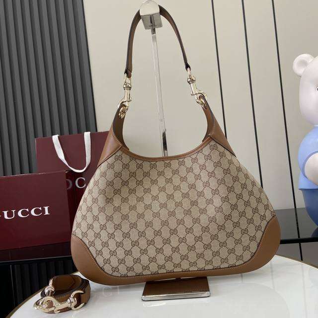 配全套原厂专柜包装 新品 呈献Gucci Body双锁扣手袋系列，灵感来源于上世纪50年代典藏设计。这款中号肩背包承载20世纪中期经典款式精髓，选用Origin