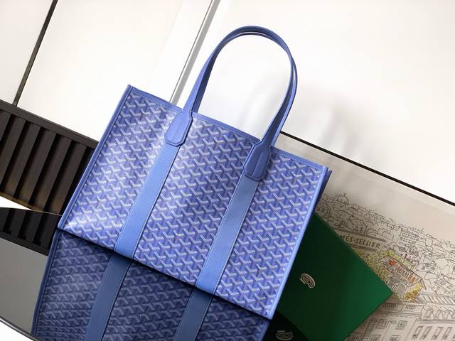 villette大号手提包作为2025 年的限量版，采用独特的小号尺寸，小巧轻便。包身采用两种颜色的 Goyardine 帆布，灵感来自亚麻花朵的鲜艳色调： 鸢