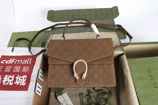 跑量价 简介 Dionysus系列手提包 这款手袋采用棕色Gg绒面材质匠造而成 虎头锁扣搭配翻盖设计 可拆卸皮革肩已发送挎背携 型号813399 材质采用专柜质