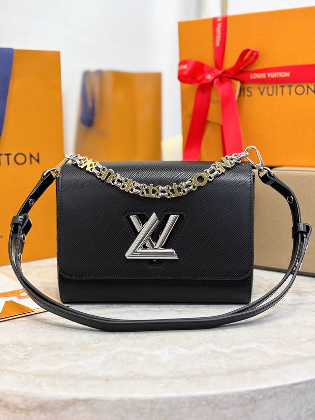 Twist 中号手袋 m13118黑色 本款 Twist 中号手袋以标志性 Epi 皮革和 Monogram 压纹皮革塑造纤薄构型 再借 L*扭锁点明 Twis