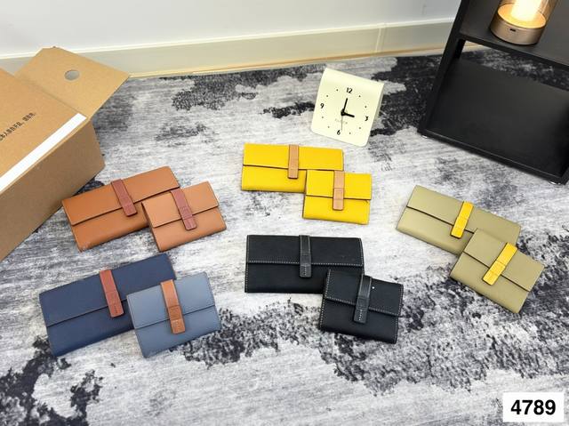 罗意威爆款牛皮中长款钱包款式经典做工精细耐磨耐用手感极佳 罗意威爆款牛皮中长款钱包款式经典做工精细耐磨耐用手感极佳