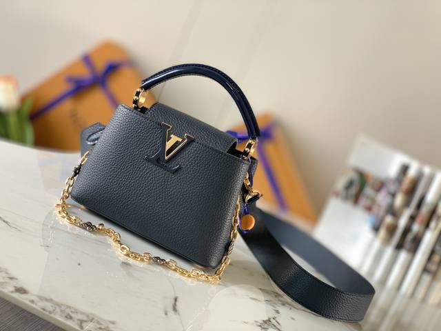 特级精品原厂皮M80239蓝色 本款 Capucines Mini手袋采选全粒面 Taurillon 牛皮革,为宛如珠宝的 Monogram 花卉镂刻 Lv 字 特级精品原厂皮M80239蓝色 本款 Capucines Mini手袋采选全粒面 Taurillon 牛皮革,为宛如珠宝的 Monogram 花卉镂刻 Lv 字