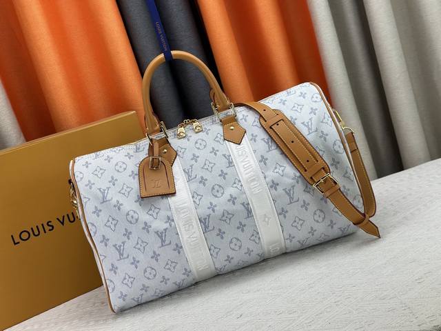 M14838白 本款 Keepall BandoulièRe 45 旅行袋取材 Monogram Heritage 涂层帆布，以华美格调传递游轮旅行风尚。内敛配