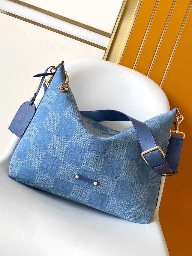 N00202 顶级原单 163芯片 本款 Vagabond Hobo 手袋为 Damier Denim 3D 棉质帆布融入牛皮革饰边和耀目金属件，以华美梭织标签