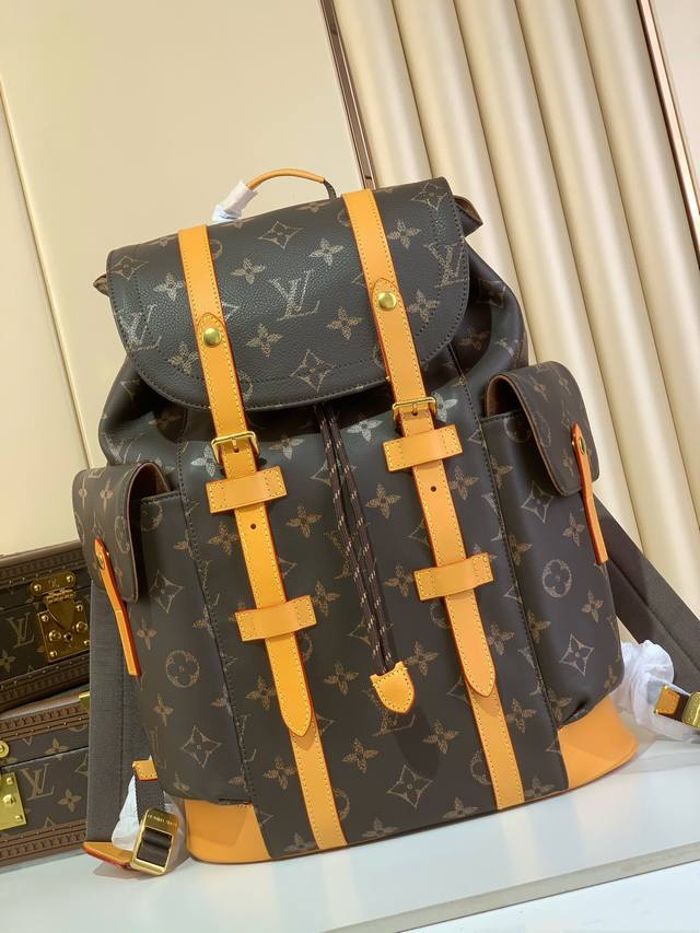 顶级原厂 Christopher 中号双肩包 M14038 全皮 Christopher 中号双肩包采用柔软牛皮革制成，饰有略大于常规的 Monogram 印花