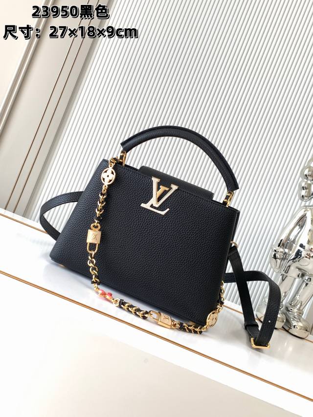 特级配全套包装 精品原厂皮M23950黑色 Capucines Mini 手袋 由全粒面Taurillon皮革制成，并辅以鸵鸟皮细节，体现了安静的奢华。标志性的