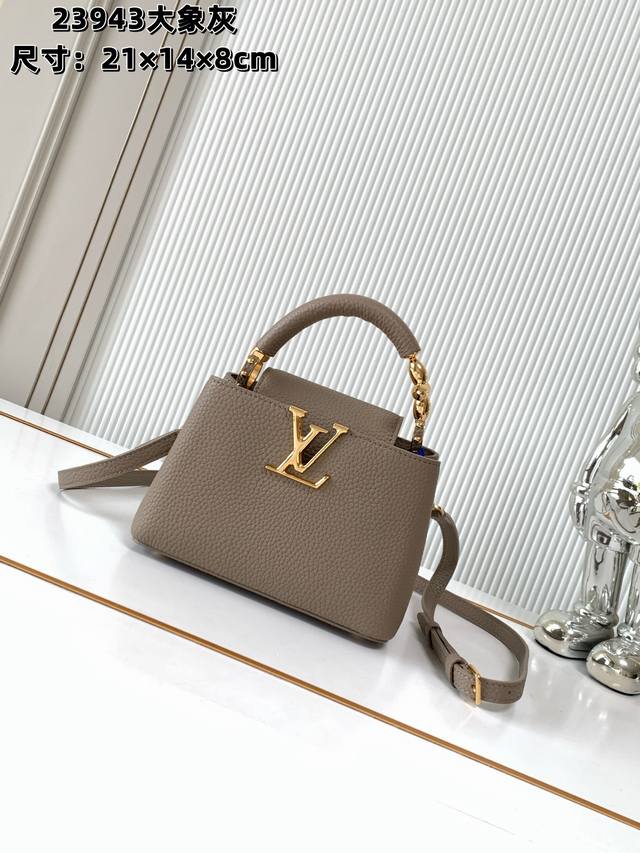 全钢五金 变码芯片 特级配全套包装 M23943大象灰 Capucines 迷你手袋 本款Capucines迷你手袋于手柄融入精致Monogram花卉，以细腻笔