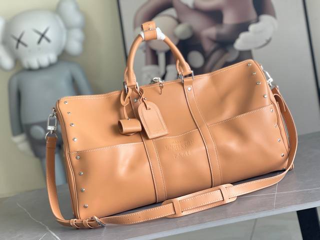 顶级原单 M11767 Keepall 50旅行袋 配肩带 此款与日本设计师藤原浩合作设计的Keepall 旅行袋融汇品牌传统元素 Monogram花纹 与充满 顶级原单 M11767 Keepall 50旅行袋 配肩带 此款与日本设计师藤原浩合作设计的Keepall 旅行袋融汇品牌传统元素 Monogram花纹 与充满