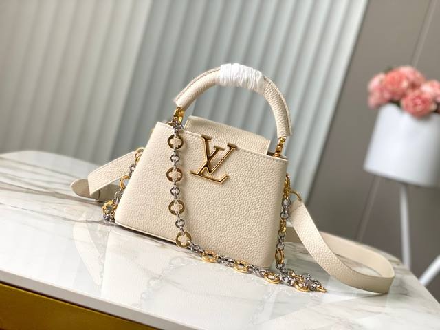 出厂价P 特级精品动态芯片M12938 M48865奶白圆花环扣款本款Capucines 手袋取材柔韧Taurillon 牛皮革 以珠宝风格双镀链条和 Mono