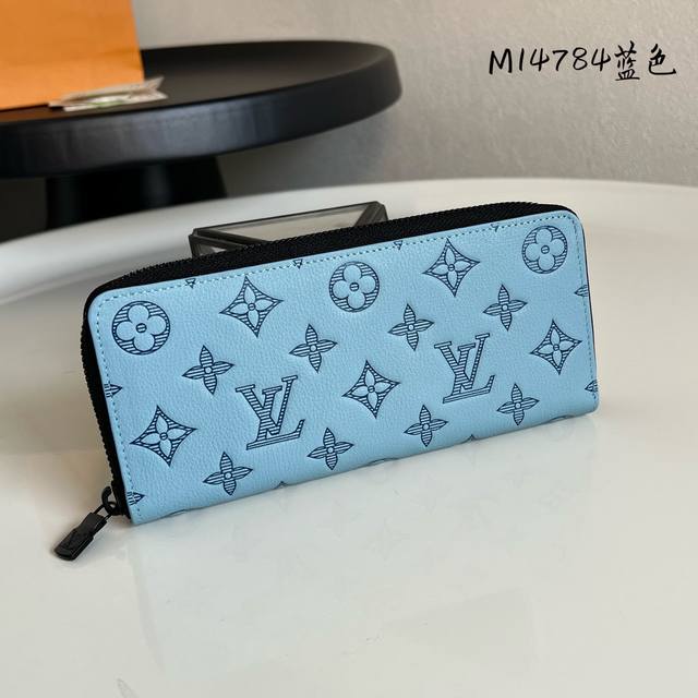出厂价P 芯片版M14784蓝色 全皮单拉链钱包 Zippy 拉链钱包 取材柔软 Monogram Shadow 牛皮革，以 Monogram 压纹和牛皮革内衬