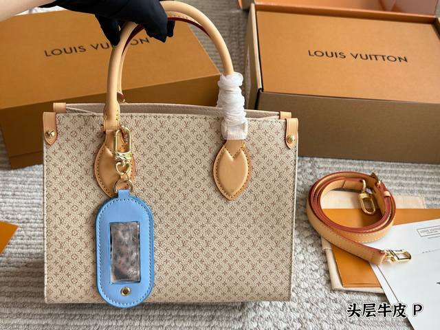 头层牛皮 配盒Size：25*20Cm 小 质量超好 懂货来 真的是太高级啦！Onthego 托特包托特包真的好好看~自带挂件超适合小甜妹手拎单肩斜挎都可以~