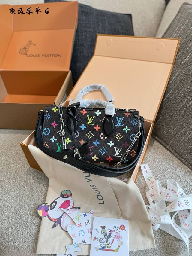 黑三彩Otg T+绝对被低估的一只Lvx村上隆黑三彩横版Onthego 暗潮艺术，通勤党的高级装备如果说横版包是大势所趋，那这只绝对是不了多得的一匹黑马。Lv村