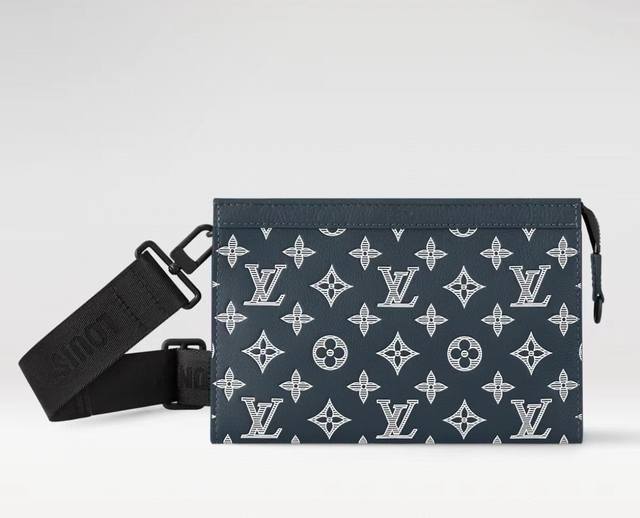 顶级原单独家实拍 M83384压印花蓝 這款混合風格的Gaston隨身錢包以Monogram塗層帆布和色彩相襯的Taga牛皮製作，為Tagarama系列作品。這