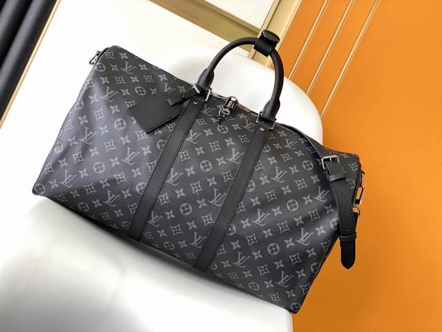 顶级原单 M40569 M40604 M40605 Keepall 45，50，55 55旅行袋，由全新标志性黑灰Monogram Eclipse帆布裁制而成。