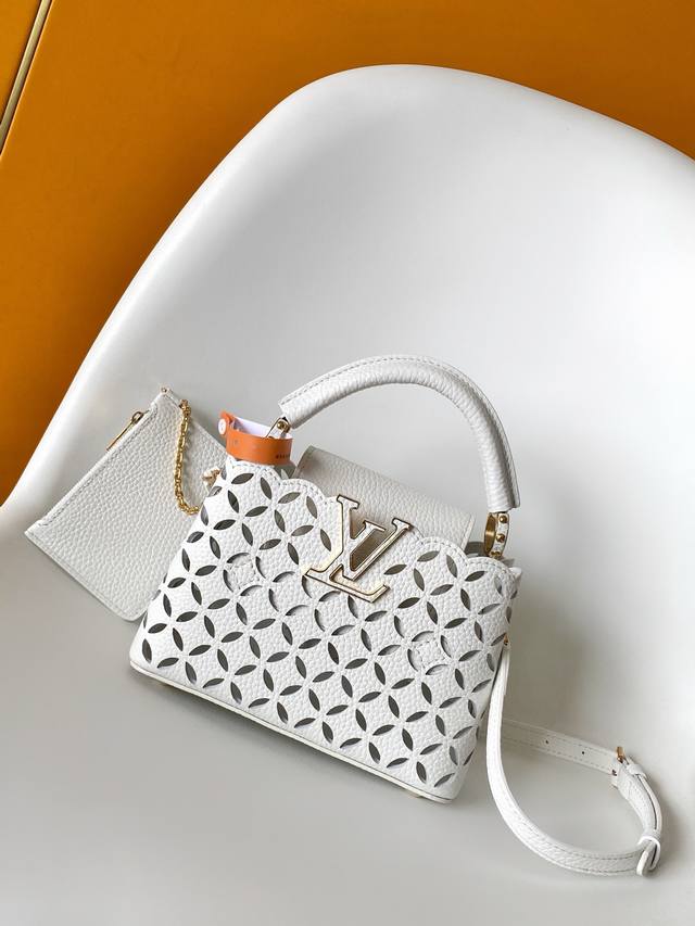 M25497 特级原厂 动态163 本款 Capucines 迷你手袋以 Bloomcut 图案于 2025 早秋系列大放异彩。激光切割牛皮革呈现细腻镂孔，巧妙