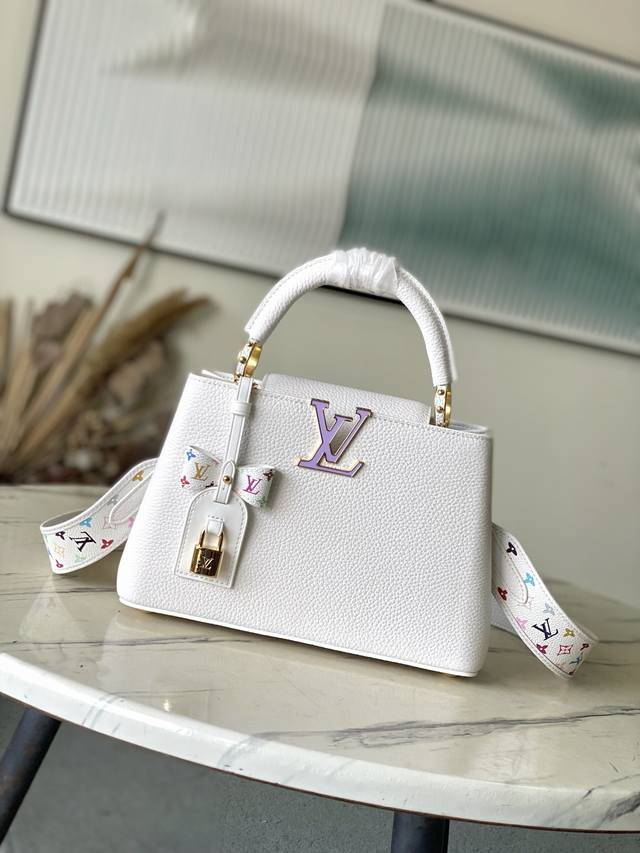 特级原厂皮 M13253小号 本款Capucines手袋出自路易威登X村上隆再版系列，选用Taurillon牛皮革妙趣演绎经典设计。Lv字母和可拆卸Monogr