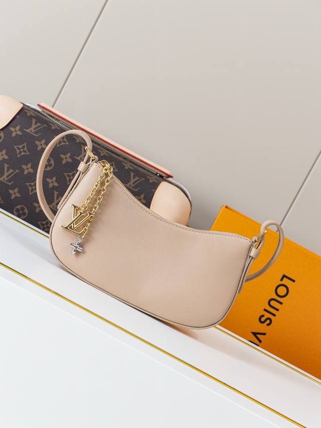 动态163C01芯片 M25784奶昔 顶级原单 独家背景实拍 本款pochette Lv Bloom，一种日夜设计，可以补充任何外观。它由小牛皮制成，采用永恒