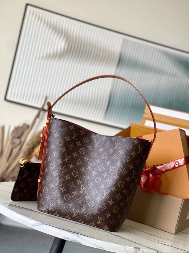 顶级原单M12926 本款Alin大号手袋采用Monogram帆布塑造水桶包构型，以充裕空间容纳笔记本电脑等日常所需。可调节皮革肩带致意1930年代的路易威登硬