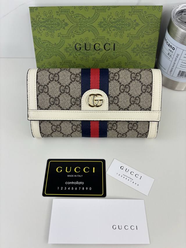 Guccl 官网同步新款！Ophidia系列～两折长夹，采用Gg Supreme高级pvc面料 配以标志性双G 五金唛头，经典著作蓝红色织带，精制而成！ 款号: