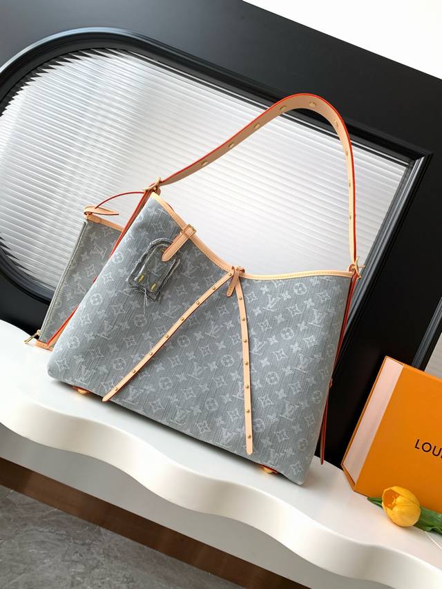 M13289对版浅色五金 动态163顶级原单 动态163 本款 Carryall 中号手袋令诞生于 2005 年的 Monogram Denim 图案栖身棉布表