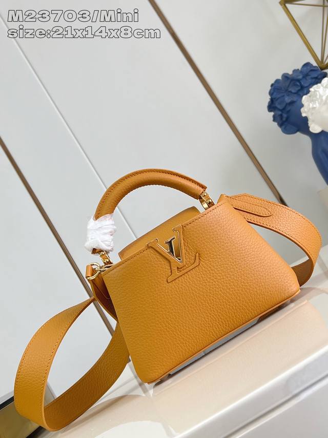 出厂价P 顶级原单 M23703橙色 迷你 本款 Capucines 迷你手袋为 Taurillon 牛皮革渲染浓郁色调，再以手柄环和 Lv 字母完善瞩目设计。