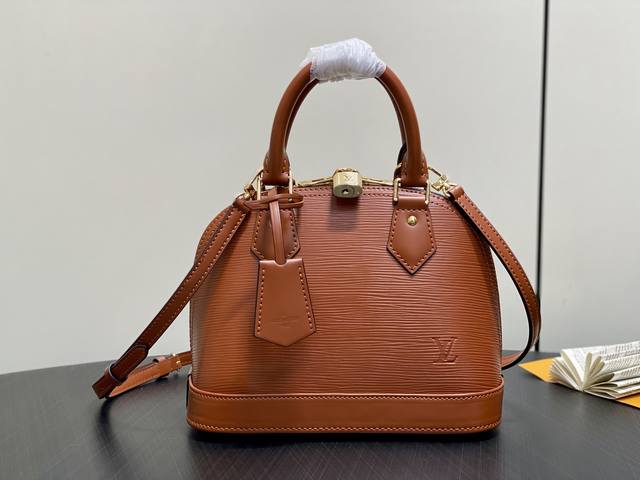 出厂价p 顶级原单 M25538焦糖 水波纹贝壳包 Alma Bb 手袋 借鉴1934年的原始设计，这个永恒的Alma Bb版本属于返校系列。它由颗粒状Epi皮