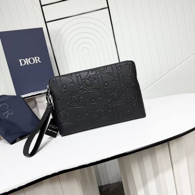 市场最高版本 原单品质 正品打版 保证进口头层牛皮，拒绝二层皮，拒绝超纤皮 这款手拿包实用而高雅，内部空间宽敞，可收纳各种日常用品。采用别致的黑色 Obliqu