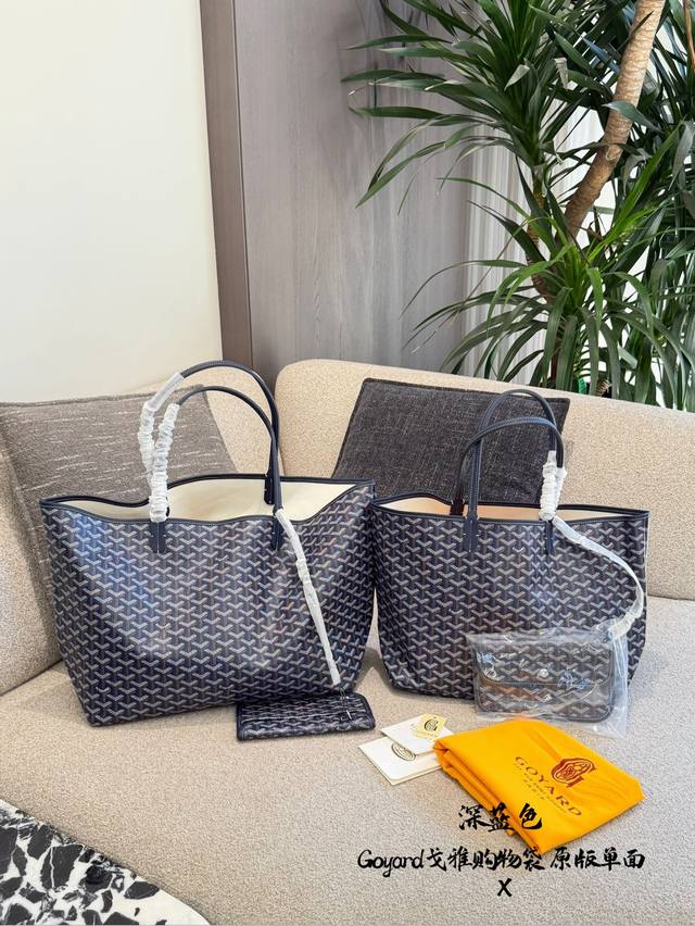 Goyard Saint Louis购物袋 Goyard Saint Louis购物袋，采用经典Goyardine涂层帆布，搭配黑色皮革饰边，简约大气。 中号尺