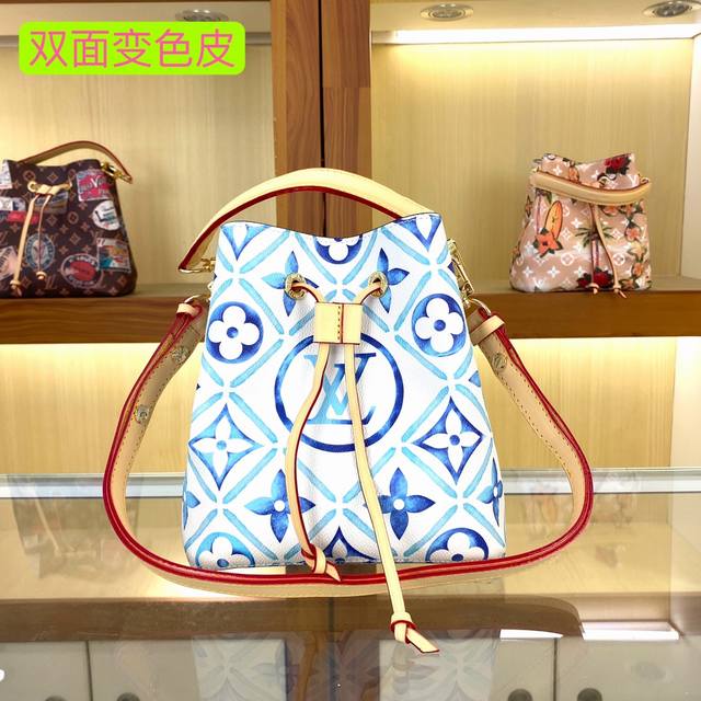 M25315，M22985，M44022，M44020 本款 Neonoé 水桶包为淡雅帆布描绘 Giant Monogram 印花，令 Lv 和 Monogr