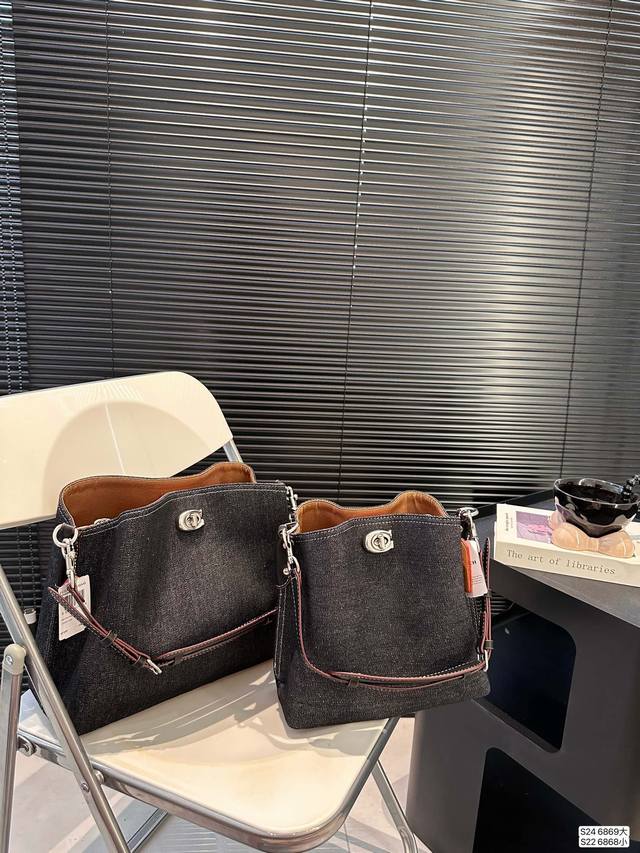 大号 小号 配折叠盒子 蔻驰5月新款托特包 蔻驰最新一季的 休闲随性的包型， 腋下 斜挎都不成问题 通勤必备尺寸：大号31 25 小号23 22.5 货号大68