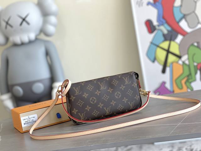 原单~M40712 老花帆布制成的一款小巧轻便的手袋，可手提可斜挎，它是你出席任何场合都可以携带的经典款式。拉链款式设计是使用更便捷。21 X 13 X 3 C