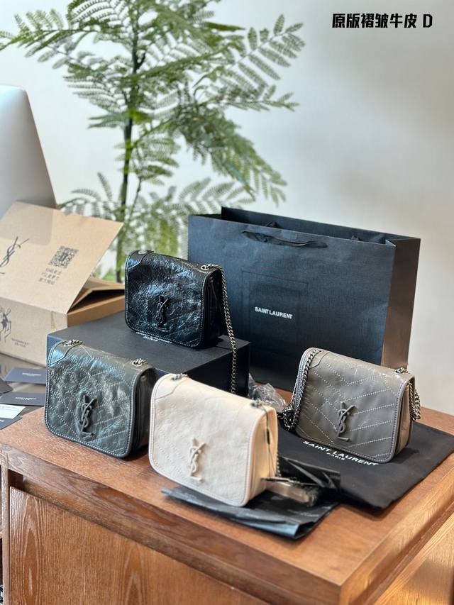 Ysl迷你号牛皮黑色 超级爆款niki热潮势不可挡油蜡牛皮材质，手感非常柔软。款式实用，容量大。五金表面是牛皮，很特别。18Cm