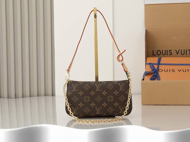 顶级原单、加强版本款 Pochette Accessoires 手袋采用 Monogram 帆布演绎经典设计，以拉链开启充裕空间，内设拉链口袋、贴袋和卡片夹层，