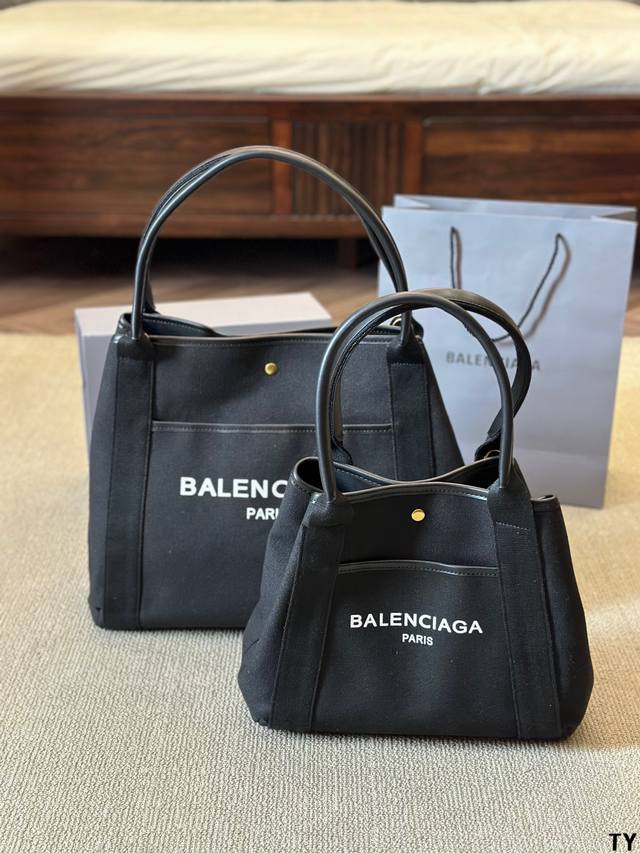 Balenciaga 巴黎世家navy Cabas 沙滩 超多网红博主们推荐 牛皮 帆布材质 包包非常耐用 包包本身自重轻 向单肩司手提 尺寸 大号38 33C
