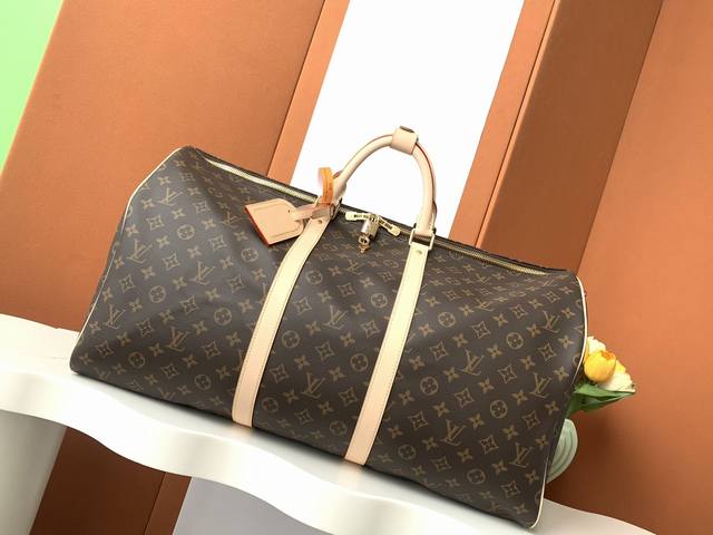 Keepall 55 旅行袋 特级加强版 型号： M41414 皮料： 是意大利a级皮料 五金： 采用进口a级全钢五金 包装： 全套原厂mb包装 尺寸：55.0