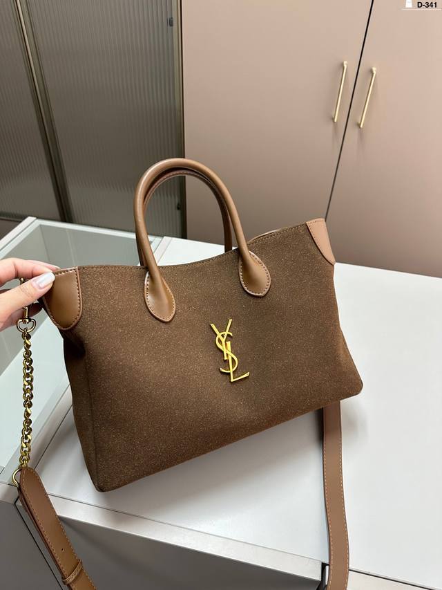 圣罗兰托特 又是心动百搭又高级 不咋挑衣服。随意拎着就能出门 单肩斜挎都可以真的绝绝子 酷飒风中又带着随意慵懒 D-341尺寸：32.11.22