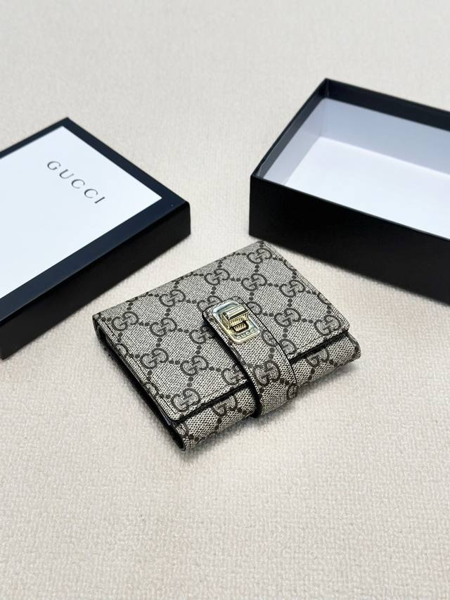 颜色 咖啡尺寸 11X10古琦爆款牛皮配pvc短款三折钱包款式经典做工精细耐磨耐用手感极佳