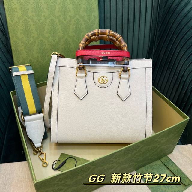 原厂皮 配原厂包装 迷你托特包融合了 顶级 竹节提手和双g配件两个具有辨识度的品牌元素。蓝色皮革材质与两根土黄色扣带相映成趣，突显灵动优雅的气质。迷你尺寸：27