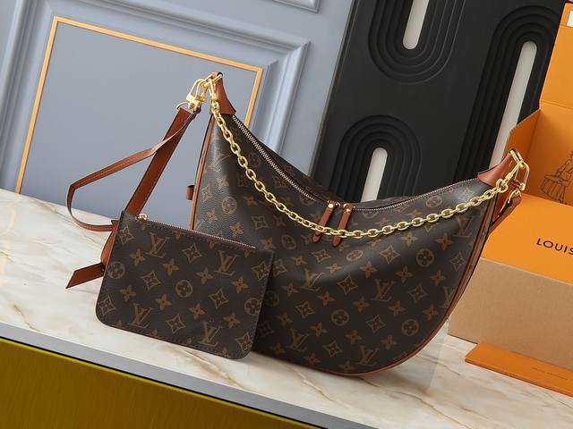 升级原版 M46739 M46725 M46738 M46311 本款 Loop Hobo 手袋选用柔软 Monogram Empreinte 牛皮革塑造贴合身