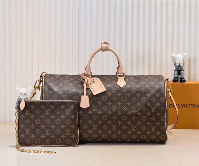 M41416 M11565 此款杰作诞生于 1930 年，在传统工艺和大胆创新之间开拓出品牌精湛匠艺。经典之作不断推陈出新，此次携 Monogram 丝印图案焕