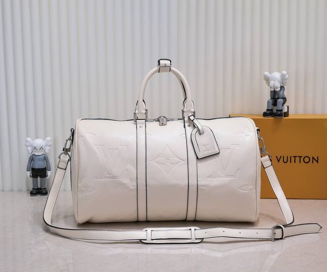 N44810 45532升级版45Cm进口头层牛皮黑压大花旅行袋 N41416 45532 Keepall是路易威登旅行袋系列的经典。这个大号Keepall以M